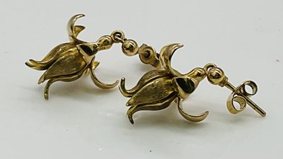 Lot 580 - A pair of 9ct yellow gold earrings modelled as...