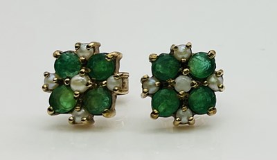 Lot 584 - A pair of 9ct yellow gold emerald and seed...