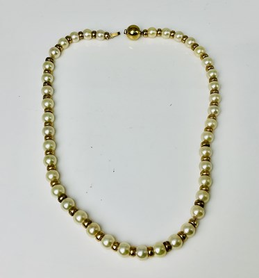 Lot 593 - A cultured pearl necklace set with 9ct gold...