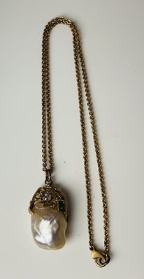 Lot 661 - A large blister pearl gem set pendant,...