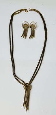 Lot 669 - A 9ct yellow gold tassel necklace and matching...