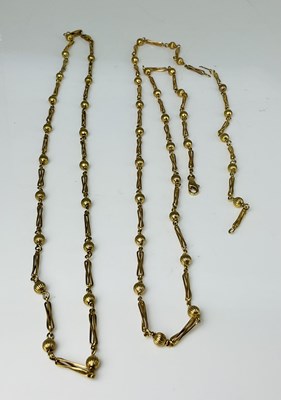 Lot 671 - Two 9ct yellow gold sphere and openwork...