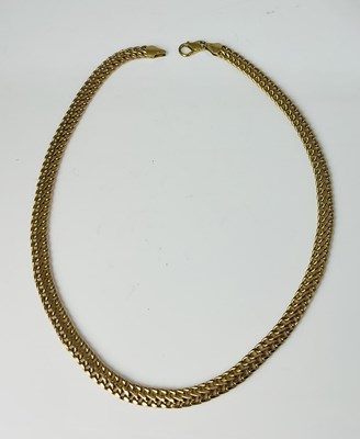 Lot 672 - A 9ct yellow gold broad flat link chain,...