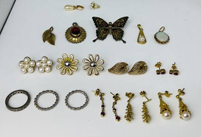 Lot 688 - A group of 9ct yellow gold earrings, combined...