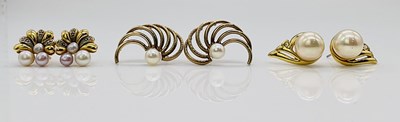 Lot 710 - Two pairs of 9ct gold pearl set earrings,...
