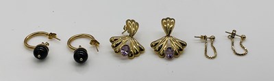 Lot 712 - Three pairs of 9ct gold earrings, combined...