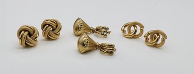 Lot 713 - Three pairs of 9ct yellow gold earrings,...