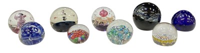 Lot 603 - A collection of nine assorted paperweights...