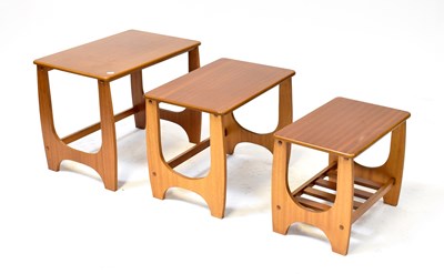 Lot 3 - A G-Plan style retro nest of three tables, 48...