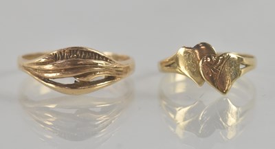 Lot 1247 - A yellow metal dress ring, size P, and a...