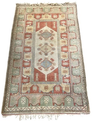 Lot 67 - A large modern Turkish woollen carpet, with...