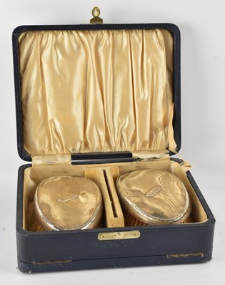 Lot 1160 - DANIEL MANUFACTURING CO; a cased pair of...