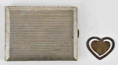 Lot 1161 - A 900 grade silver rectangular cigarette case,...