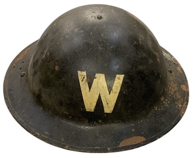 Lot 379 - A WWII military helmet, painted with letter 'W'...