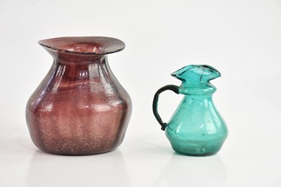 Lot 1988 - Two pieces of Roman style free-blown glassware,...