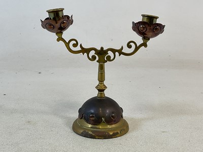 Lot 322 - An Arts and Crafts copper and brass two-branch...