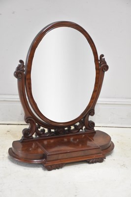 Lot 311 - A Victorian mahogany oval toilet mirror, 86 x...