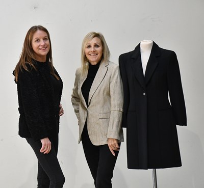 Lot 334 - GIORGIO ARMANI; a knee length 100% wool lined...