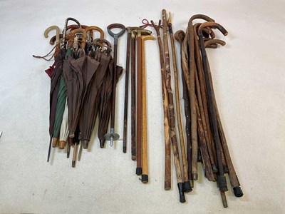 Lot 175 - A quantity of Walking canes; together with a...