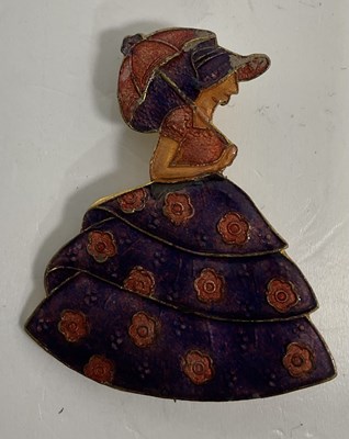 Lot 141 - A base metal enamelled ballroom stick pin,...