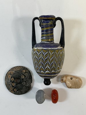 Lot 112 - An interesting group of five antiquities...