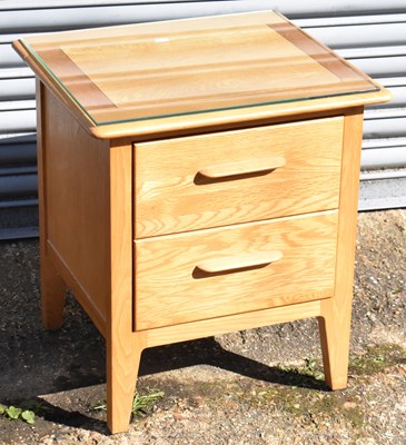 Lot 73 - A small light oak bedside table, width 53cm.