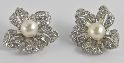 Lot 1286 - A pair of white metal diamond and cultured...