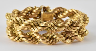 Lot 1307 - A substantial yellow metal double rope twist...