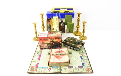 Lot 751 - Two pairs of brass candlesticks, the largest...