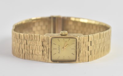 Lot 1391 - BUECHE GIROD; a lady's 9ct gold square faced...