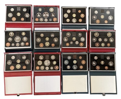 Lot 1374 - THE ROYAL MINT; twelve cased UK annual proof...