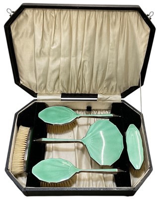 Lot 1112 - DANIEL MANUFACTURING CO a cased five piece...