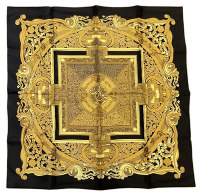 Lot 453 - HERMÈS; a boxed silk scarf, 'Animaux Solaires',...