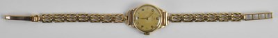 Lot 1401 - OMEGA; a lady's 9ct yellow gold wristwatch,...