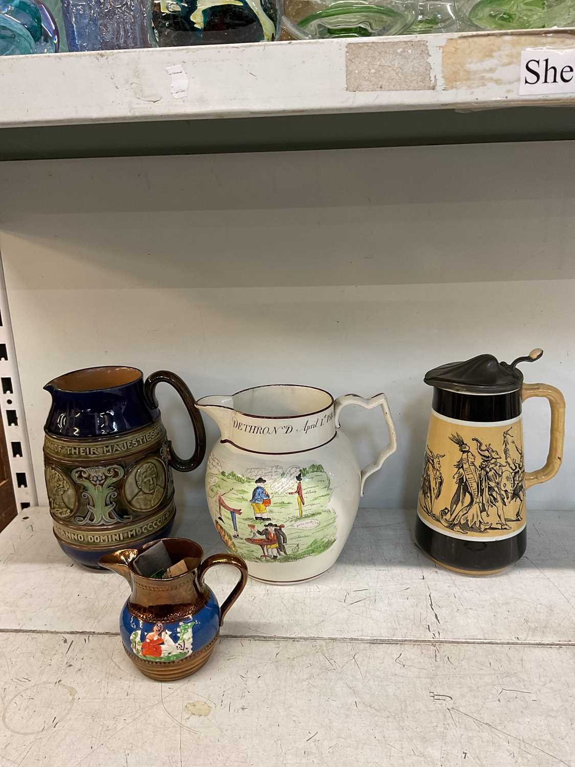 Lot 324 - A Doulton Lambeth jug, and three other jugs,...