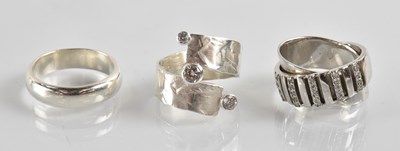 Lot 1244 - A modern 925 hallmarked silver wedding band,...