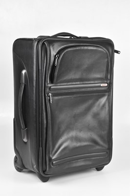 Lot 107 - TUMI; a black calfskin leather suitcase with...