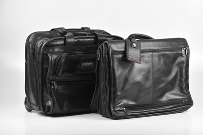 Lot 80 - TUMI; a black expandable laptop briefcase,...