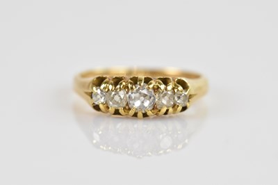 Lot 2428 - A Victorian style yellow metal diamond five...