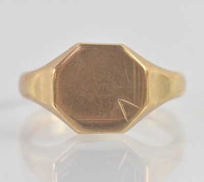 Lot 1219 - A 9ct yellow gold signet ring, the plain table...