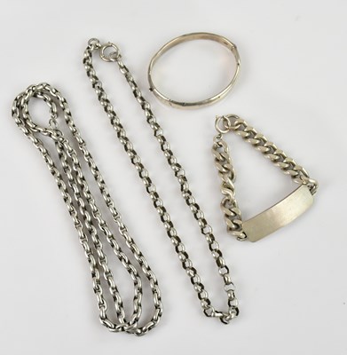 Lot 1013 - A hallmarked silver hinged snap bangle, a...