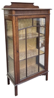 Lot 43 - A 1920s oak display cabinet, with glazed door...