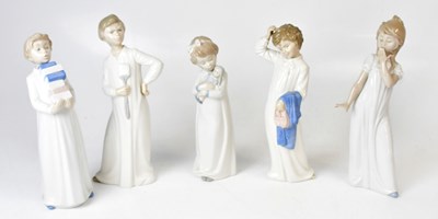 Lot 128 - NAO; five figures of children in nightshirts,...