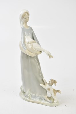 Lot 628 - LLADRO; three figures, including two cherubs,...