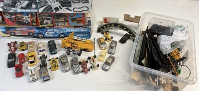 Lot 114 - SCALEXTRIC; a quantity of cars, track...