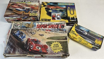 Lot 116 - SCALEXTRIC; three sets of racing slot cars,...