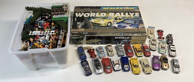 Lot 117 - SCALEXTRIC; a quantity of track, accessories,...