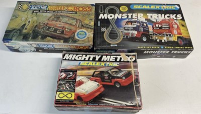 Lot 119 - SCALEXTRIC; three sets to include Monster...