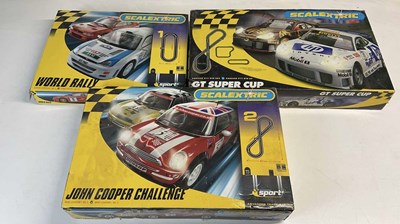 Lot 120 - SCALEXTRIC; three sets to include World Rally,...