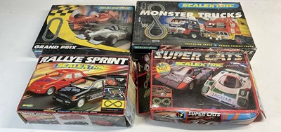 Lot 121 - SCALEXTRIC; four sets to include Jaguar Super...